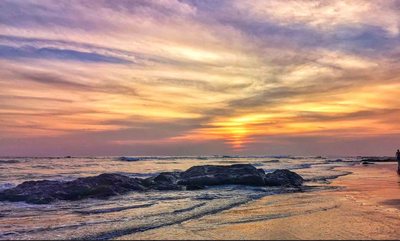 Sunset over the surf at Playa Avellanas, Costa Rica