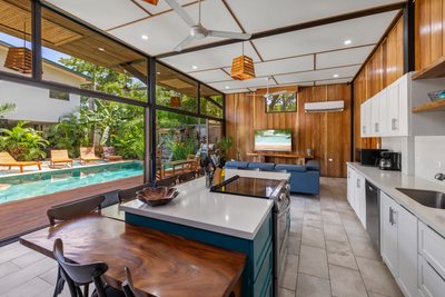 Open kitchen and living area at Johnny's Beach Bungalow