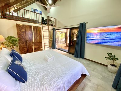 Ocean Suite bedroom with loft at Johnny's Beach Bungalow, Playa Avellanas
