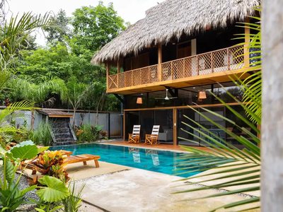 Turquoise pool and deck at Johnny's Beach Bungalow, Playa Avellanas