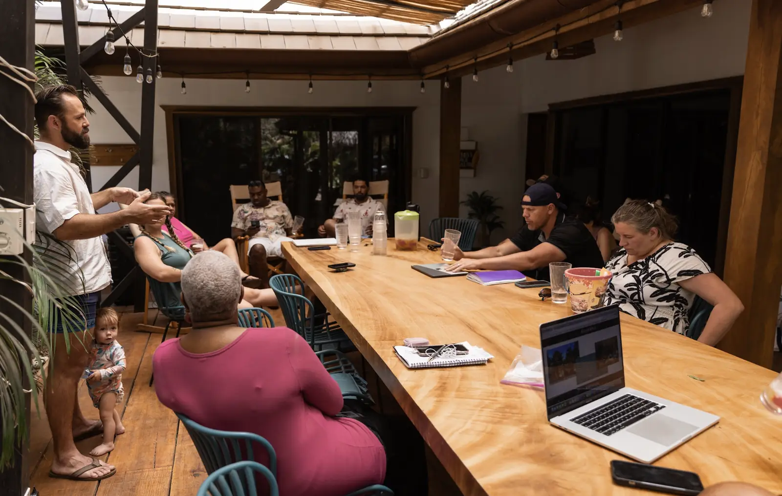 Retreat working session at the long table under the covered pavilion at Johnny's Beach Bungalow, Guanacaste