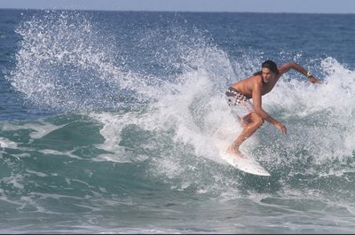 Surfing at Playa Avellanas, Costa Rica