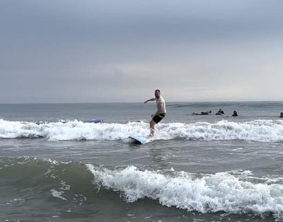 Surfing at Playa Avellanas, Costa Rica