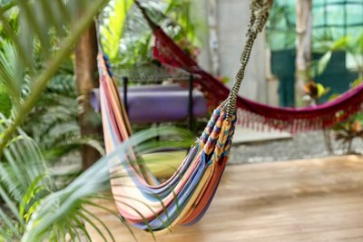 Thatched yoga and massage platform at Johnny's Beach Bungalow