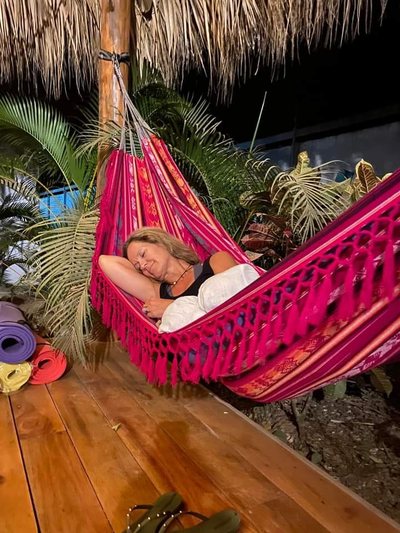 Thatched yoga and massage platform at Johnny's Beach Bungalow